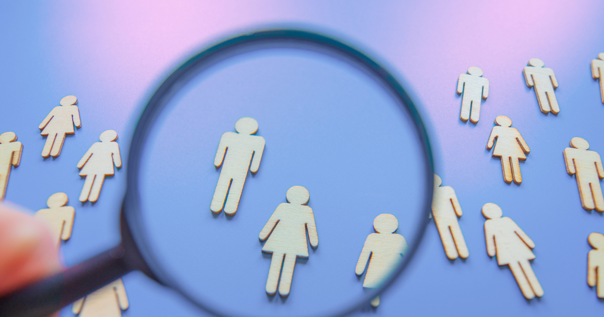 Image of a magnifying glass zooming in on customers. Demographics, Cocktail Creative