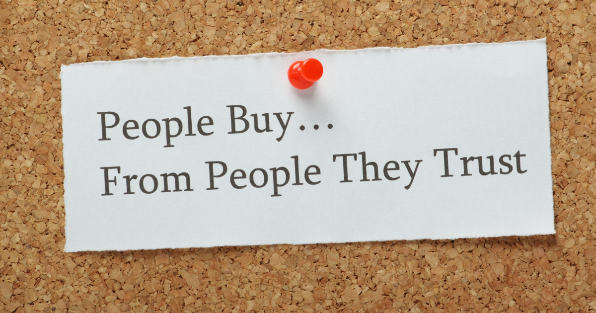 pin board sign saying "People buy from people they trust", cocktail creative